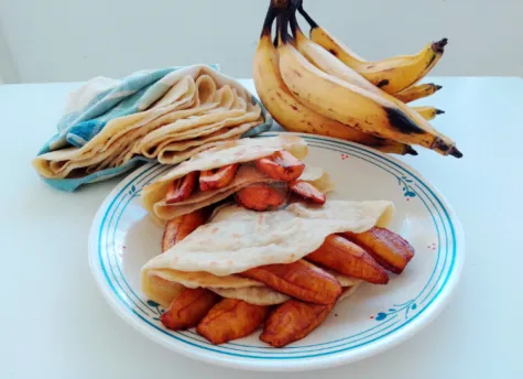 Fried Plantain and Roti on a plate