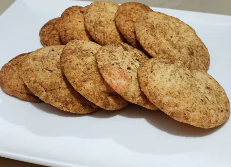 Multiple Gluten Free Snickerdoodles on a baking sheet