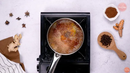 Spices simmering in a pot of boiling water
