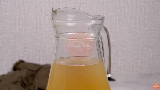 A jug of lime juice mixture
