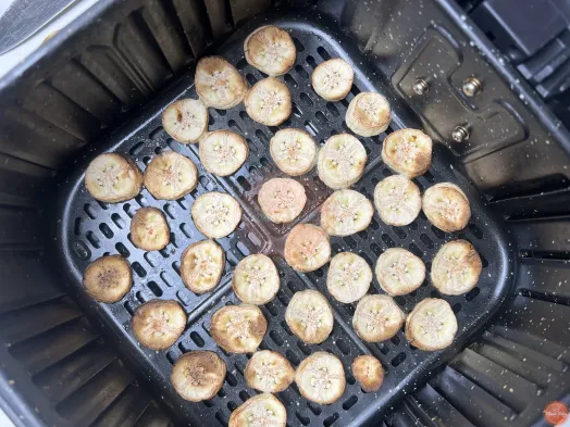 Partially cooked unriped bananas in an air fryer