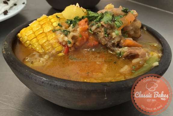 Front shot of Trinidad Corn Soup in pot clay bowl
