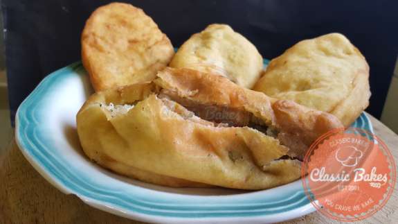 Front shot of a plate of Trinidad Aloo Pie 