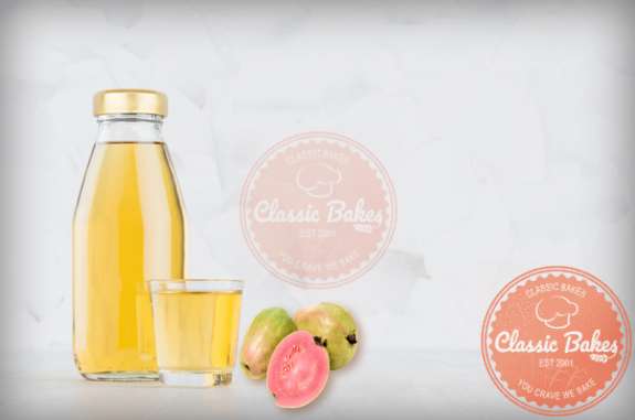 Side shot of Guava Wine in a bottle in white background