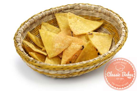Front shot of Homemade Tortilla chips in a basket