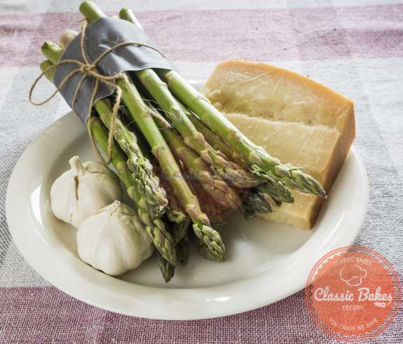 Ingredients of Garlic Parmesan Asparagus in a plate