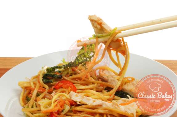 Close up shot of Guyanese Chow Mein with a chopstick
