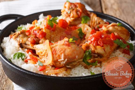 Front close up shot of Chicken Creole in a ceramic pot