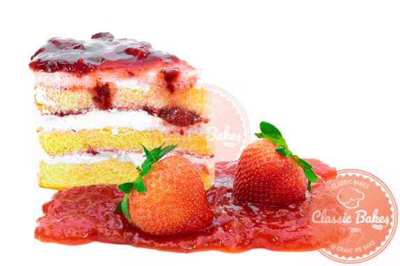 Front shot of Sugar Free Cake with strawberry on the side