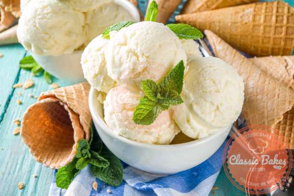 Close up shot of Vegan Vanilla Ice Cream in a bowl with cones on the side