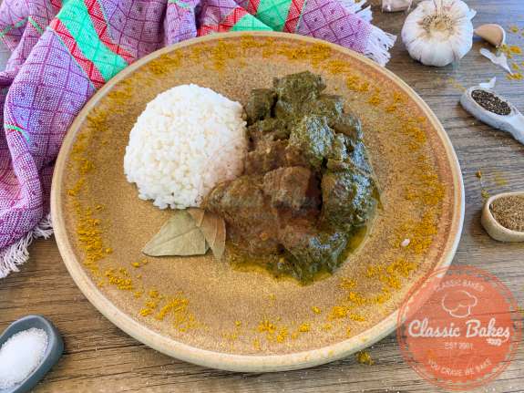Full view of Trinidadian Curry Goat on a plate