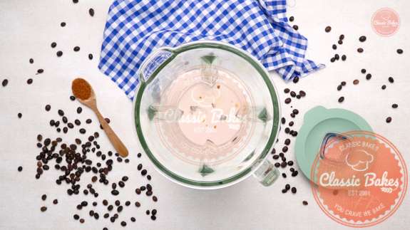 Arial of a blender with cream 