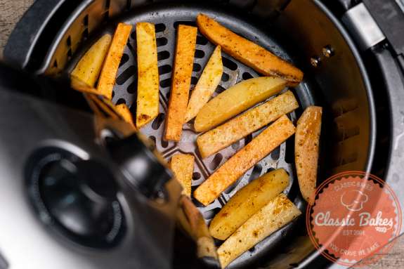 Arial of fries cooking in an air fryer 