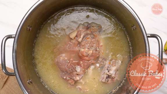 Arial view of cooked pigs foot in a pot 