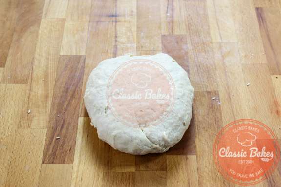 Ball of dough on a countertop 