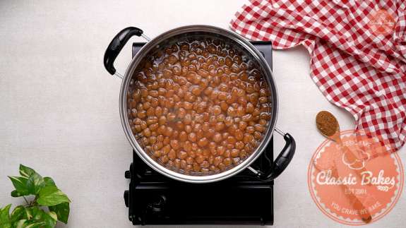 Boba pearls being simmered in a pot  