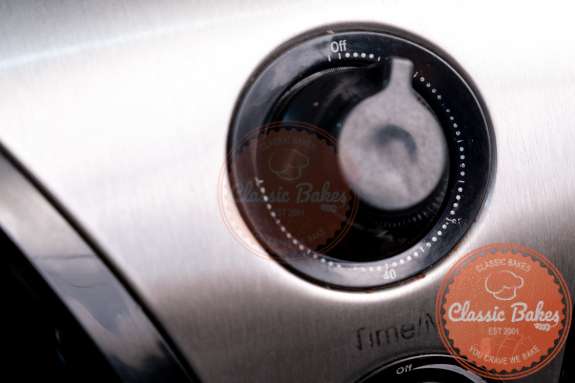 Closeup of an air fryer temperate dial 
