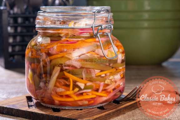 Sealed jar of shredded vegetables in liquid 