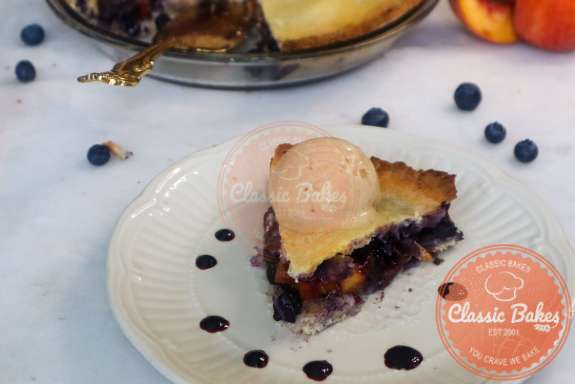 Closed Up Shot of Peach Blueberry Pie 