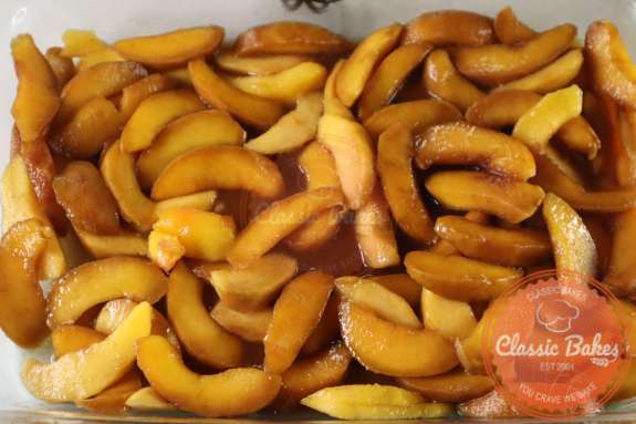 Peaches in a baking dish. 