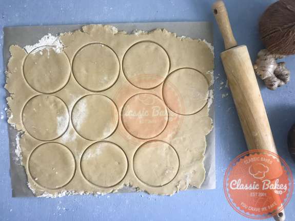 Tart dough cut out into circles 