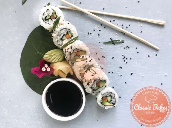 Top View of Veggie Sushi Rolls with pair of chopsticks