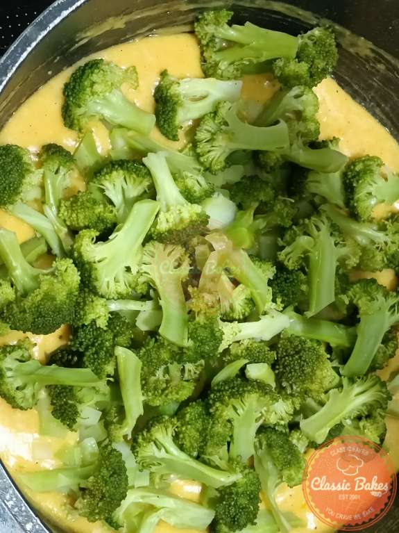 Combining broccoli to the seasoning and egg mixture