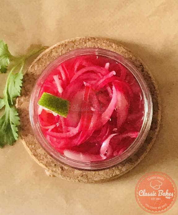 Overview of a jar of pickled red onions