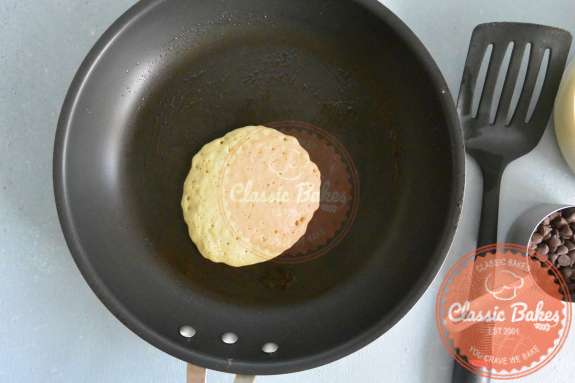 Overview of a pancake being cooked in a pan 