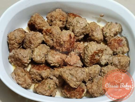 Swedish meatballs placed in a serving dish