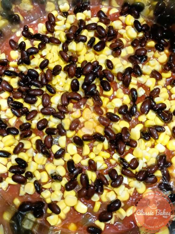 Adding corn and black beans