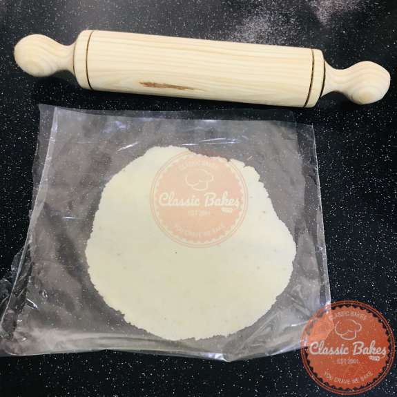 Low carb corn tortilla dough being rolled out 