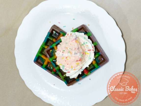 Aerial shot of Rainbow Waffles with Whipped Cream