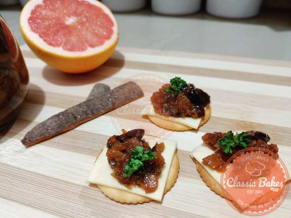 Front shot of persimmon chutney serve in crackers