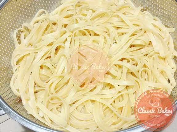 Draining cooked pasta