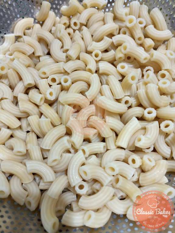 Draining the macaroni pasta