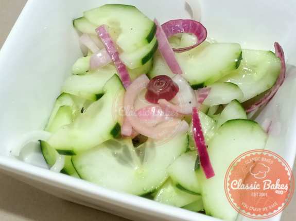 Close up view of Marinated Cucumbers
