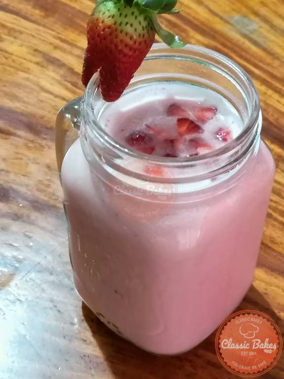 Serving Pour the Strawberry Horchata