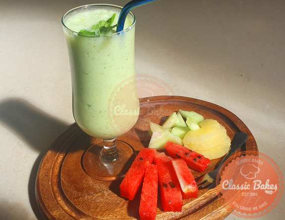 Honeydew Smoothie with fruits on the side