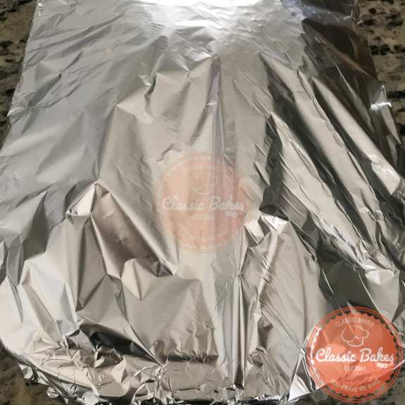 Overview of a baking dish wrapped in foil 
