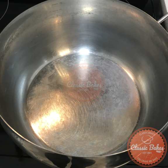 Overview of a pot heating up on the stovetop 