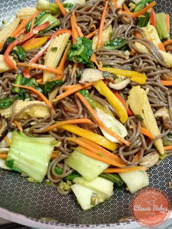 Sauteed vegetables with soba noodles added