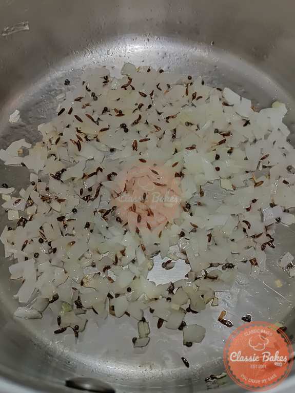 Adding oil and frying the onion