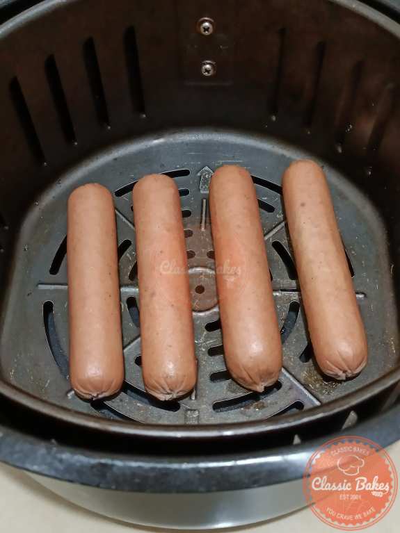 Prepare hotdogs in the air fryer basket