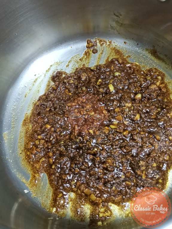 Sauteed spice mixture in a pot
