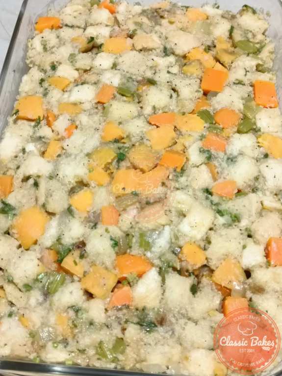 Putting the stuffing into the baking dish