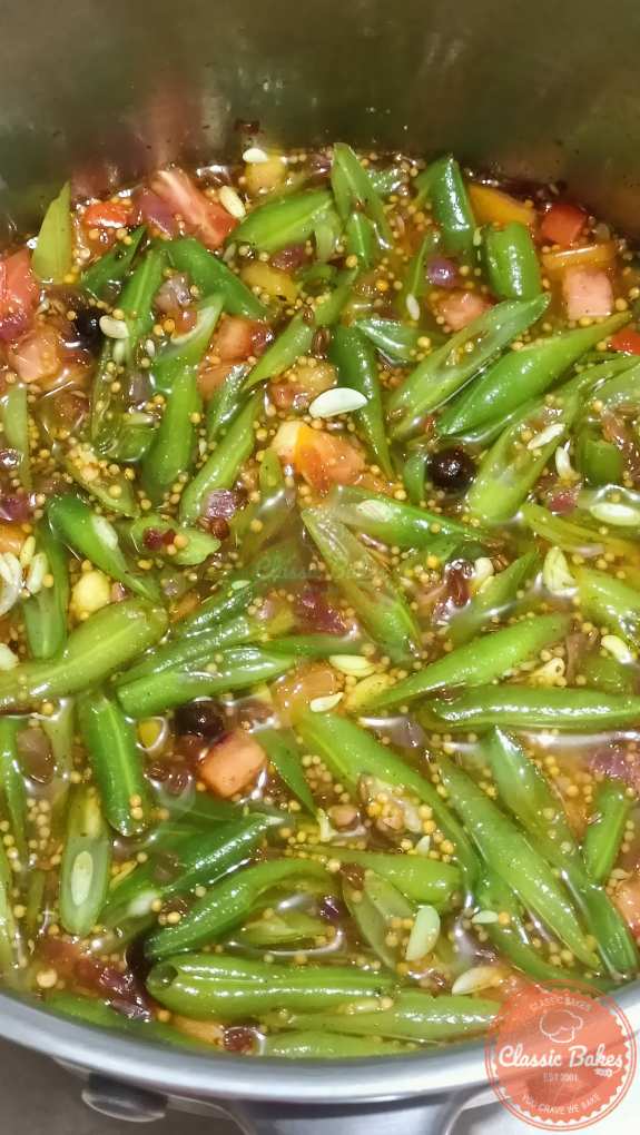 Combined tomatoes, runner beans, mustard and vinegar mixture