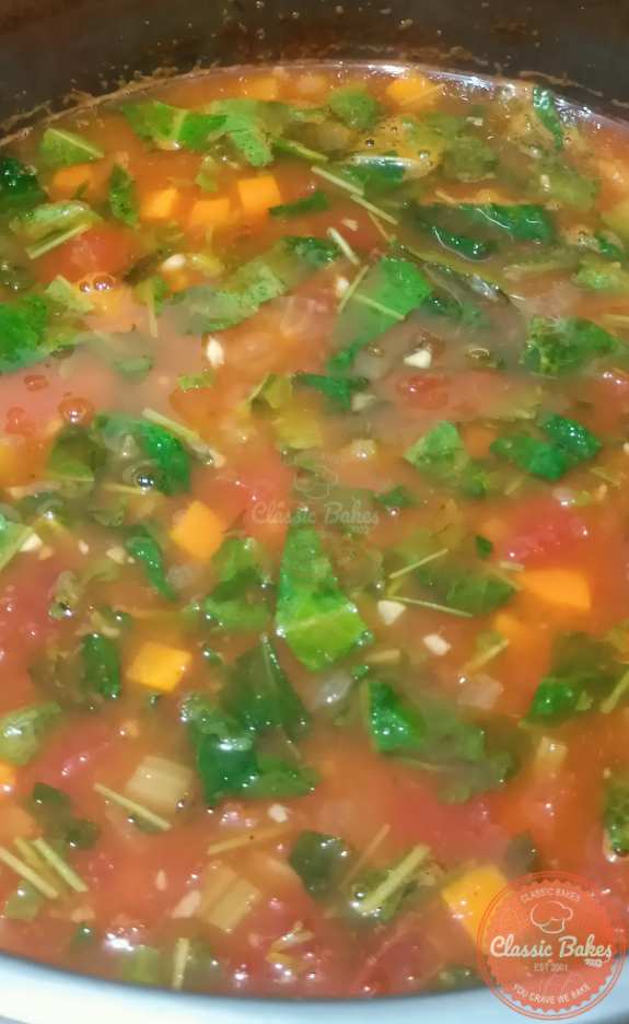 Season the vegetable soup and add the kale