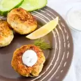 Three pieces of Bajan Fish Cakes in a plate