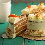 Sliced Whole Carrot Cake with Cream Cheese Frosting 